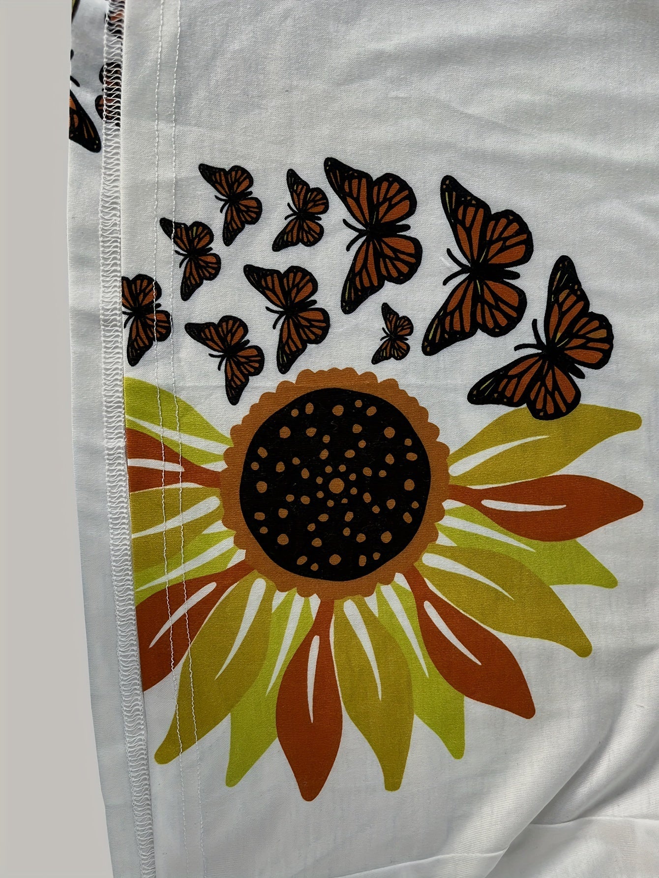 Clara|Robe d'été à bretelles motif tournesol